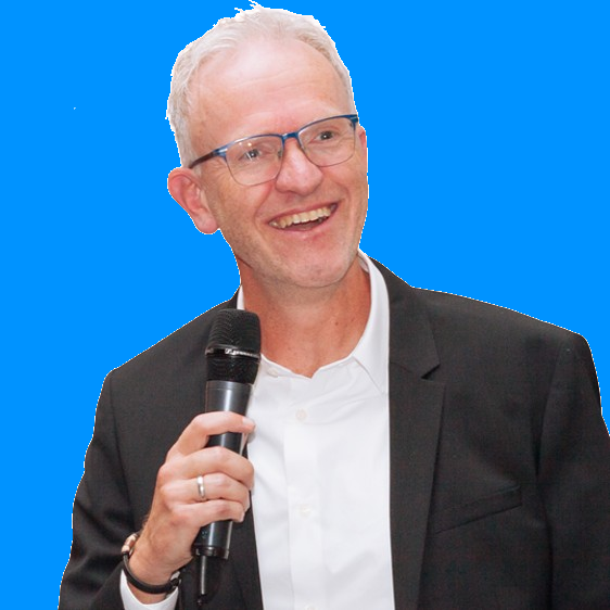 Bob Bogaard speaking with a microphone
